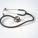 Stethoscope and medical record on a desk