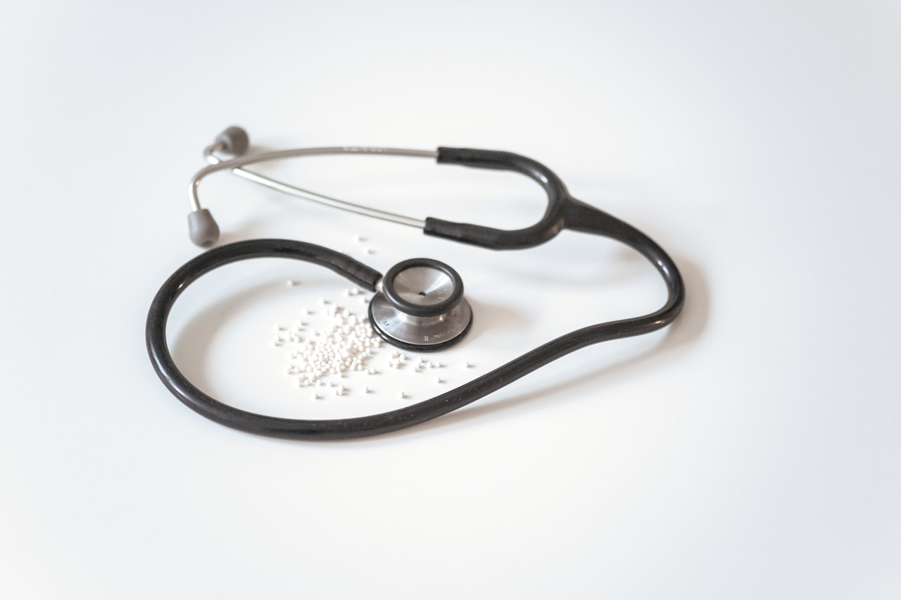 Stethoscope and medical record on a desk