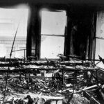Charred sewing machines and debris cover the factory floor of the Triangle Waist Company, 9th floor, Asch Building, after the fire of March 25, 1911