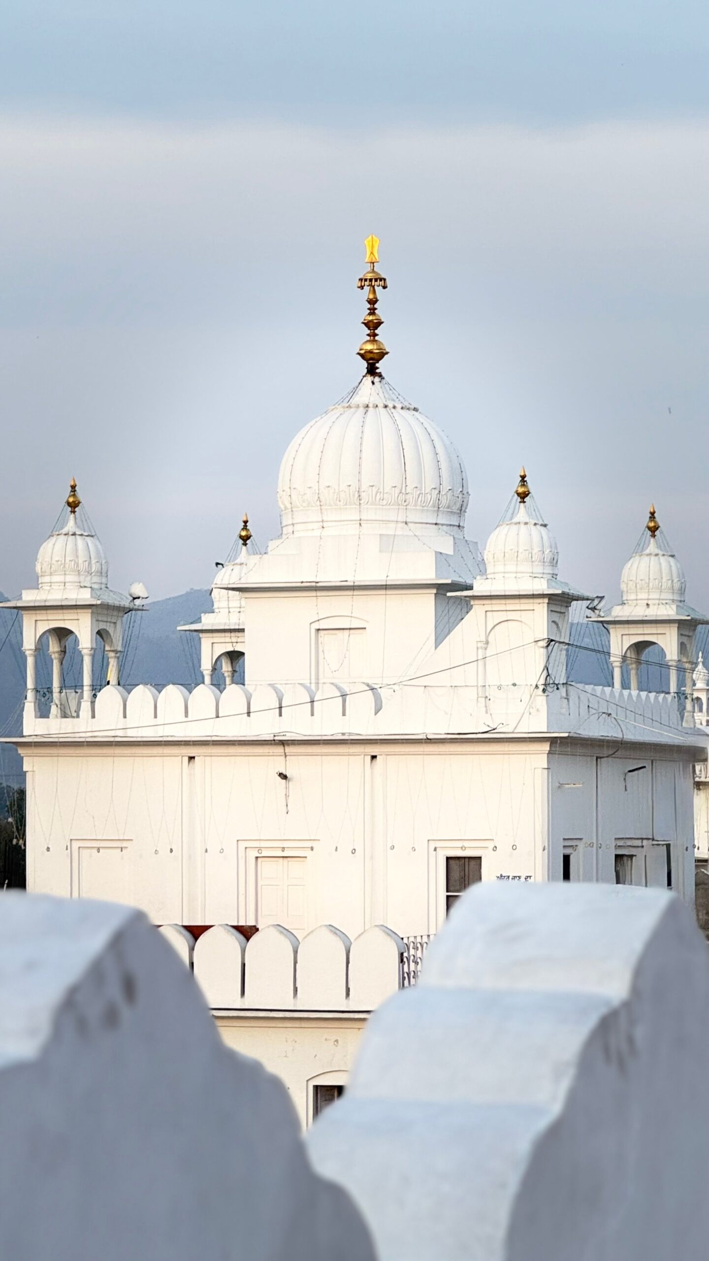 White gurdwara dome in Anandpur Sahib, Punjab, India (illustrative image)